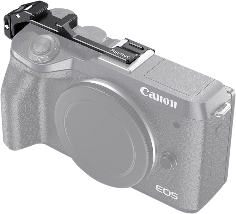 Moves the shoe mount from the center to the right side of the camera.