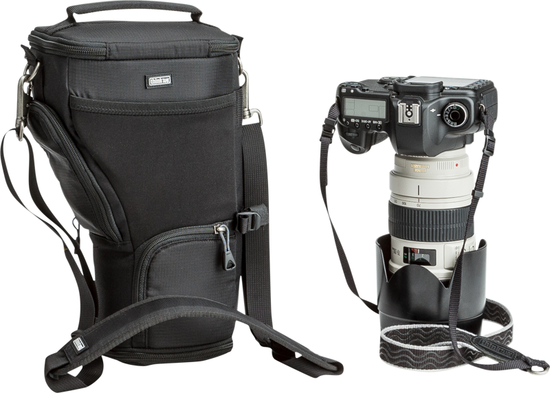 Unique holster developed for a regular size DSLR with a 70-200mm f/2.8 and lens hood in shooting position