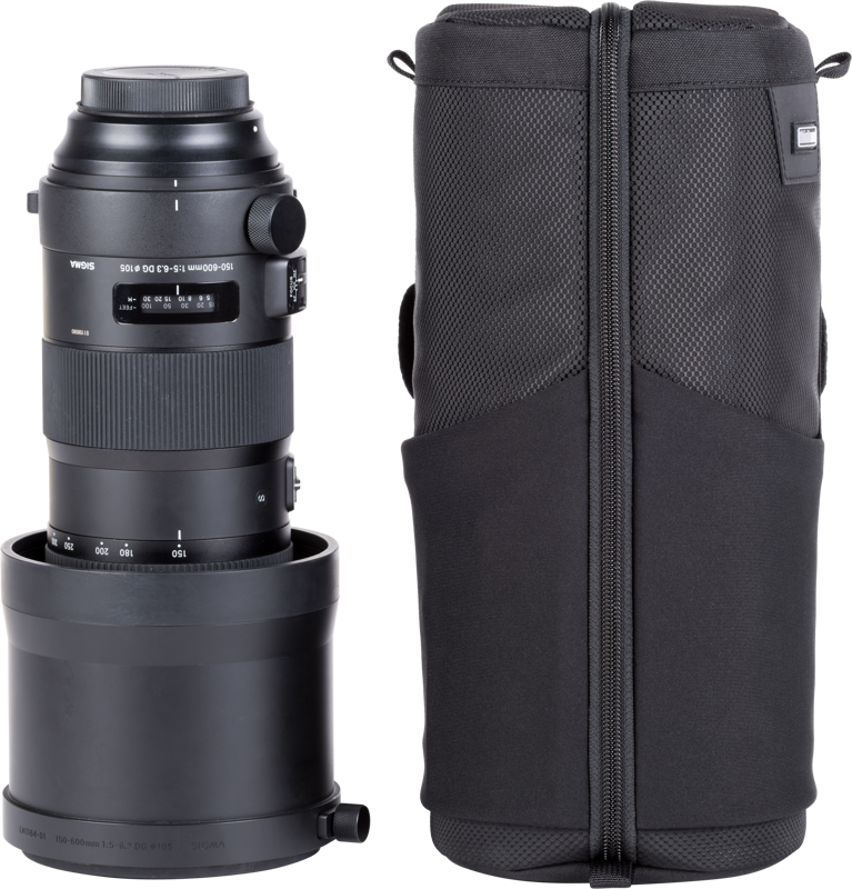 Modular pouch accommodates a 150–600mm f/5–6.3 lens with hood reversed.