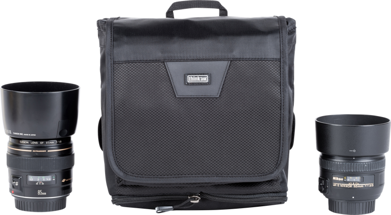 Lightweight compressible modular pouch fits 1 gripped body or 2 smaller lenses.