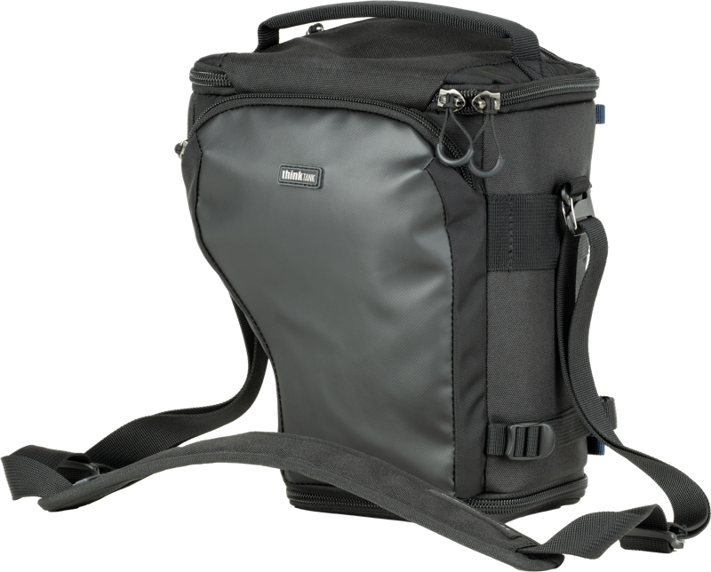 Unique holster developed specifically for a standard-size mirrorless camera body with a 24-70mm f/2.8 attached with the hood reversed. Popped-down