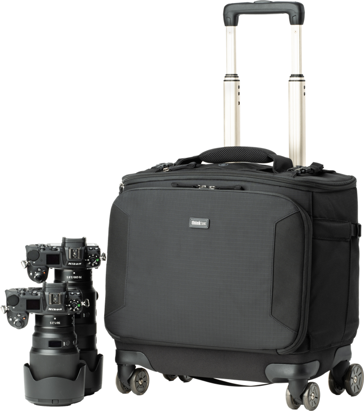 8-wheel roller bag offers top and front openings for quick gear access. It accommodates two gripped camera bodies side-by-side