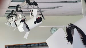 Top rail and hoist system